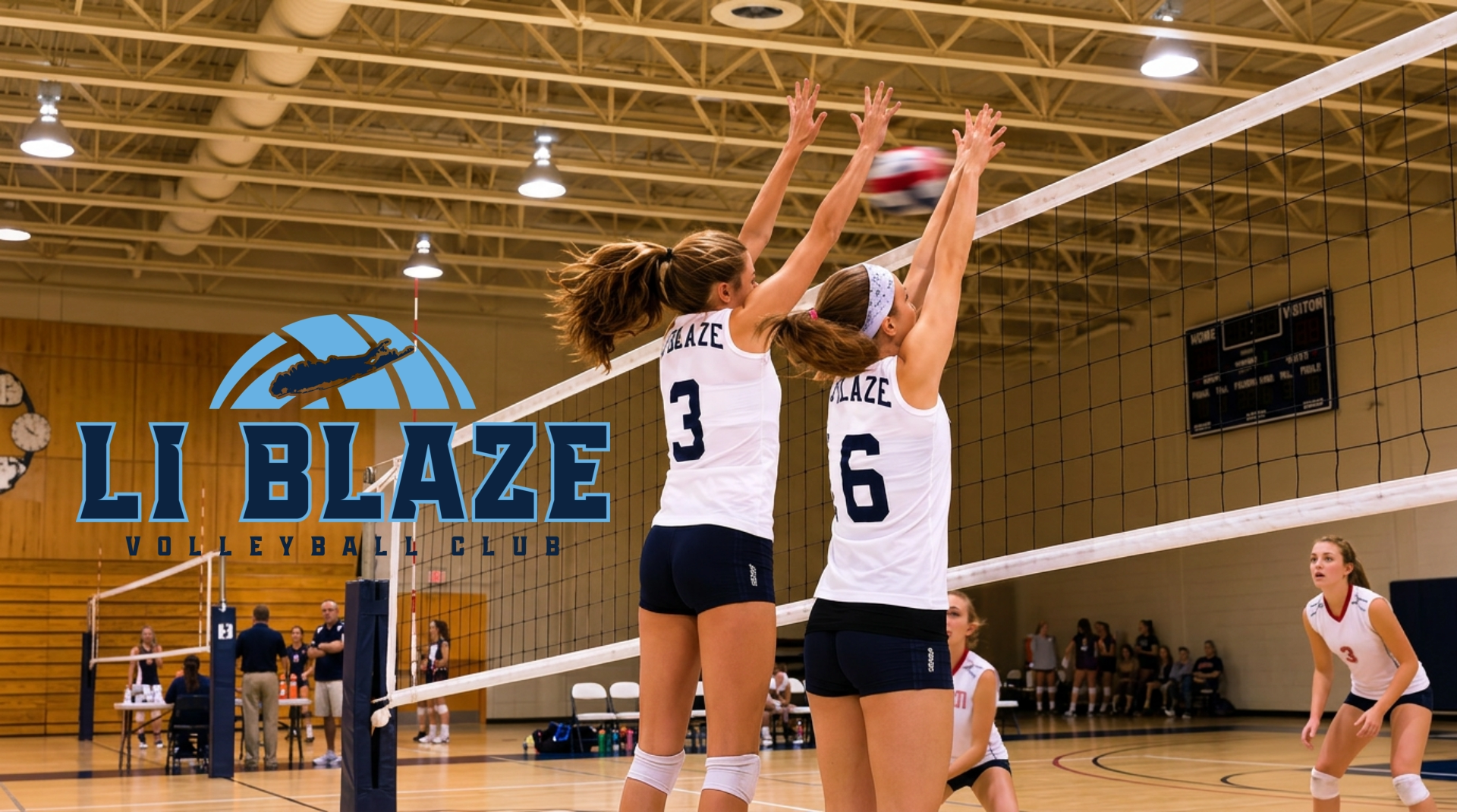 long island blaze voleyball club showing two girls jumping and block ball at the net